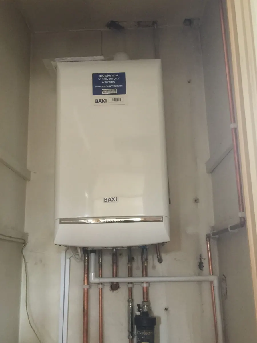 Baxi boiler neatly installed in a cupboard in Telford