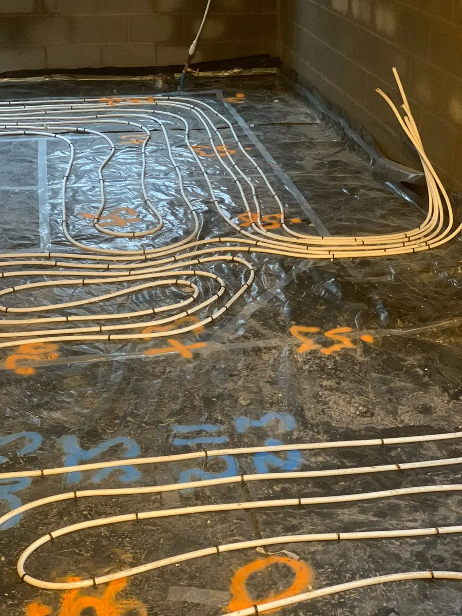 Underfloor heating loops laid before screed in Telford